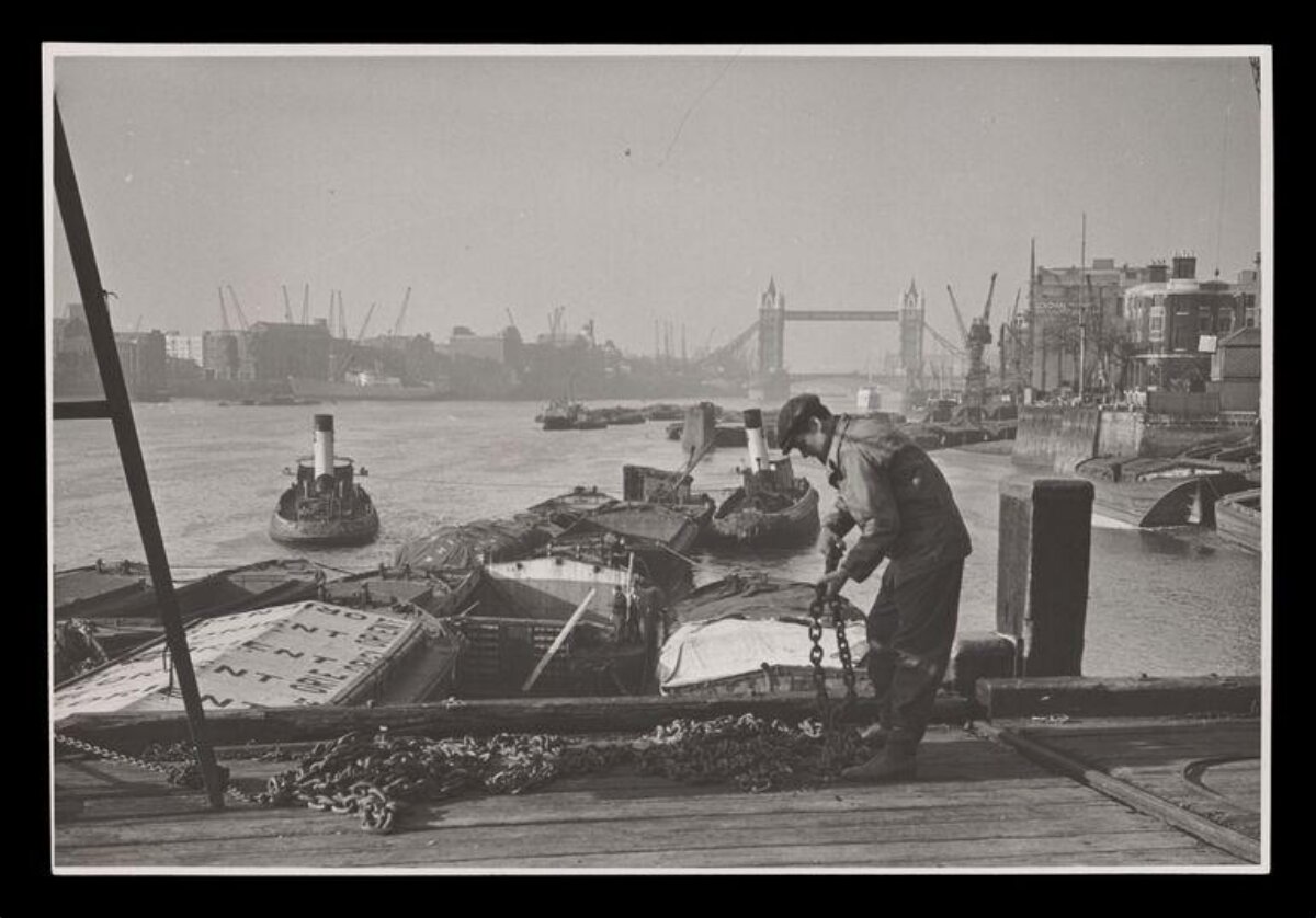 Dock Worker on Thames with Tower Bridge