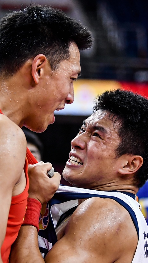 Two Basketball Players in Confrontation