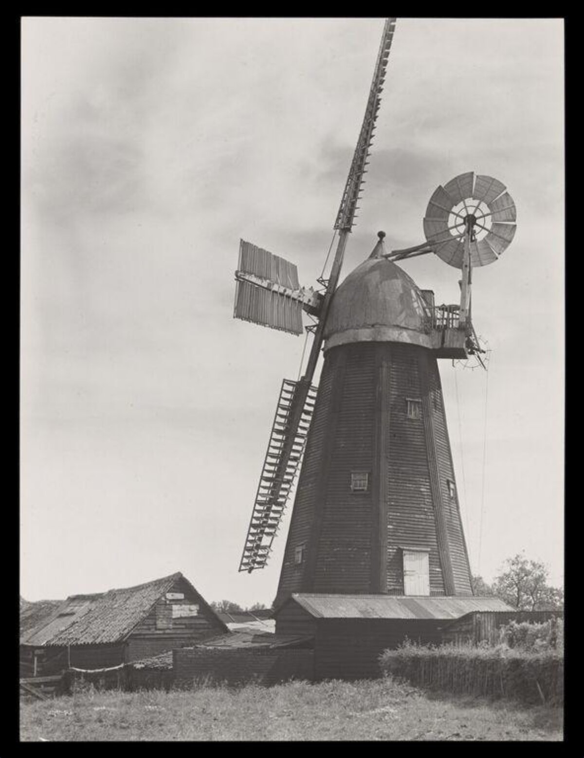 Old Wooden Windmill in Countryside