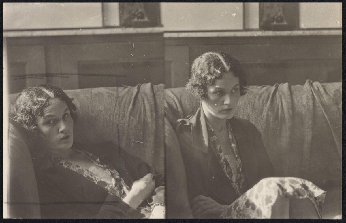 Two Women Sitting on Vintage Sofa