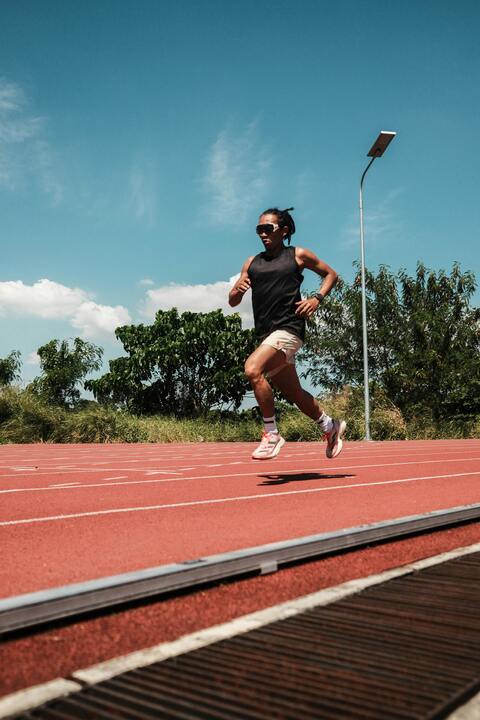 Runner Training on Outdoor Running Track