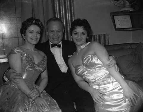 Three People in Formal Attire Posing