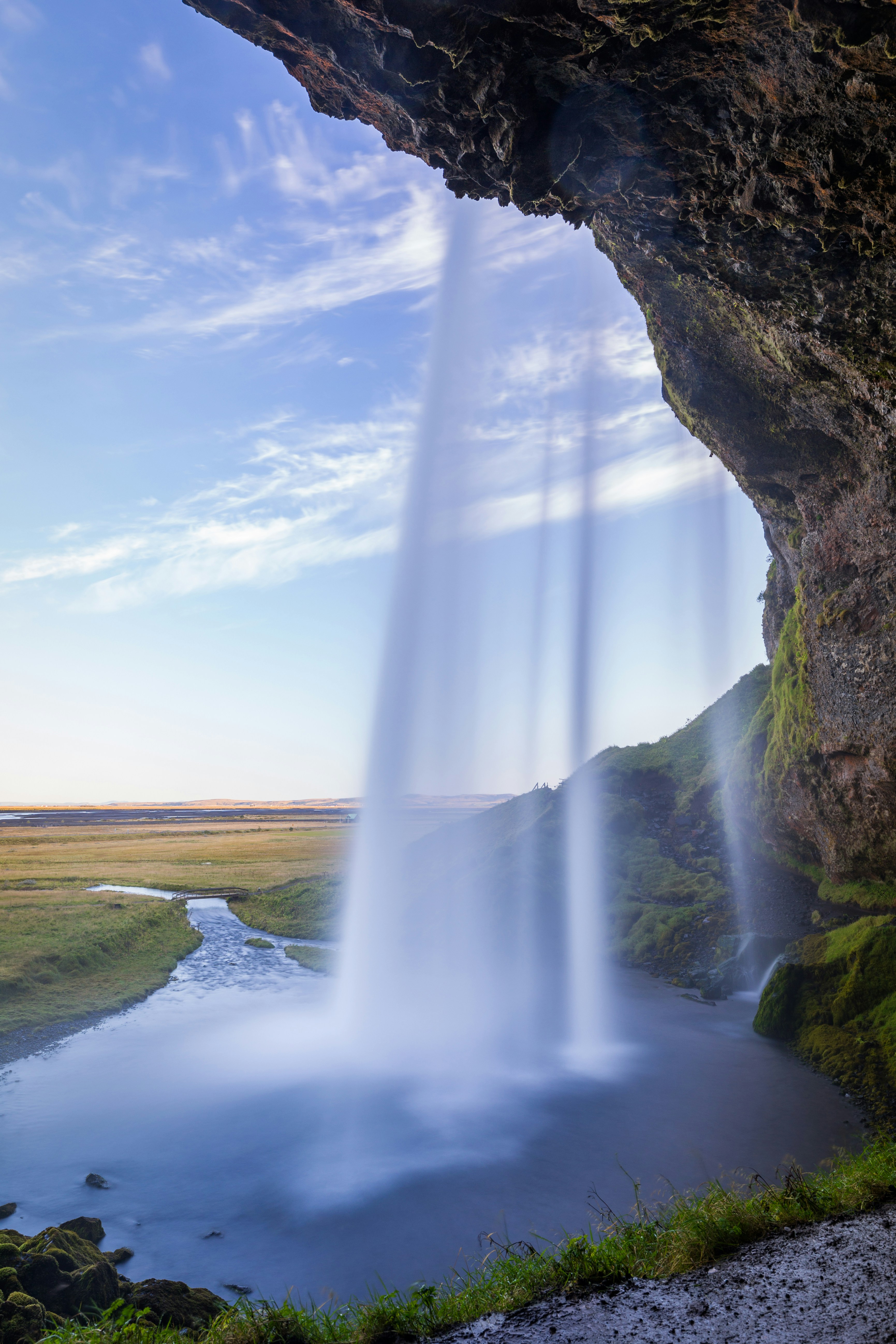 Waterfall View From Behind Cave
