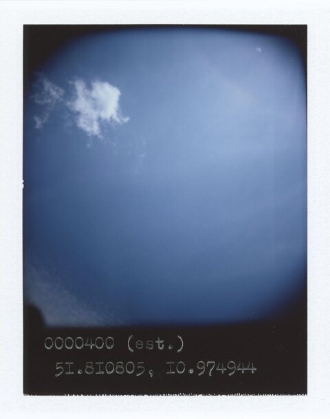 Blue Sky With Wispy Cloud