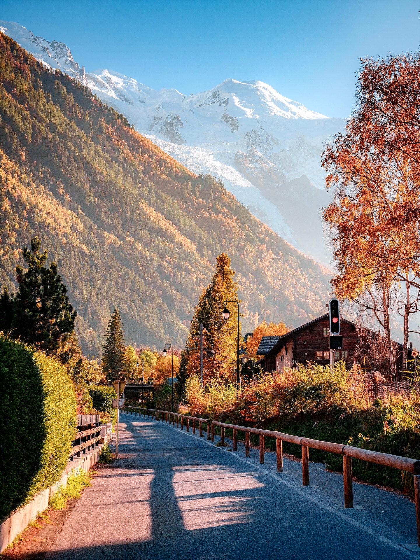 Autumn Mountain Road With Snowy Peaks