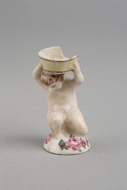 Damaged Porcelain Cherub Figurine