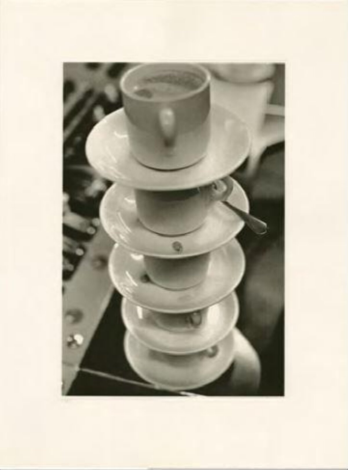 Stacked Coffee Cups and Saucers