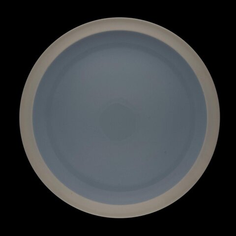 Round Blue Plate on Black Background