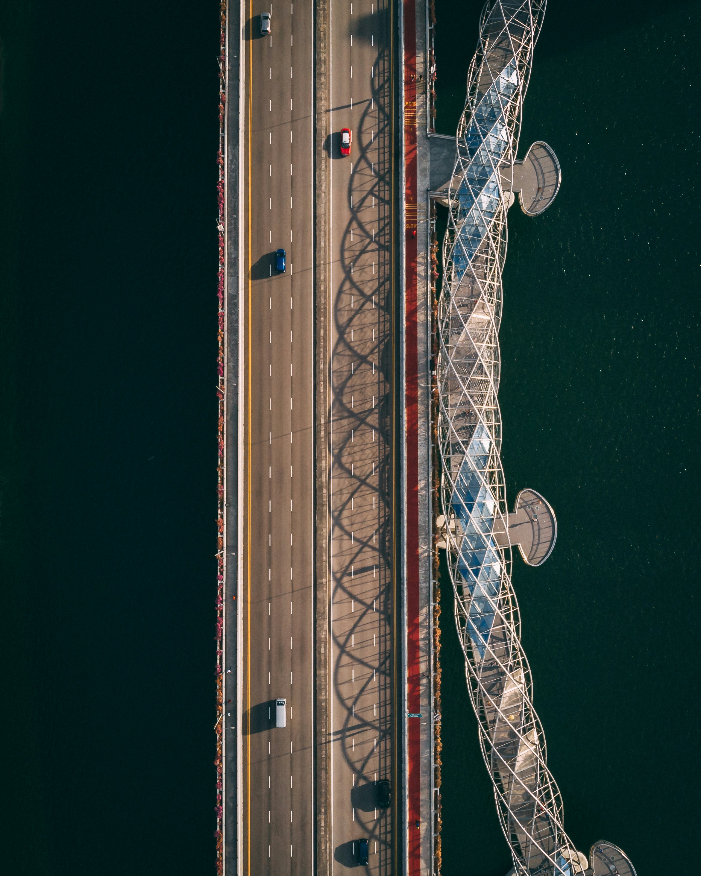 Aerial View of Road and Footbridge Over Water