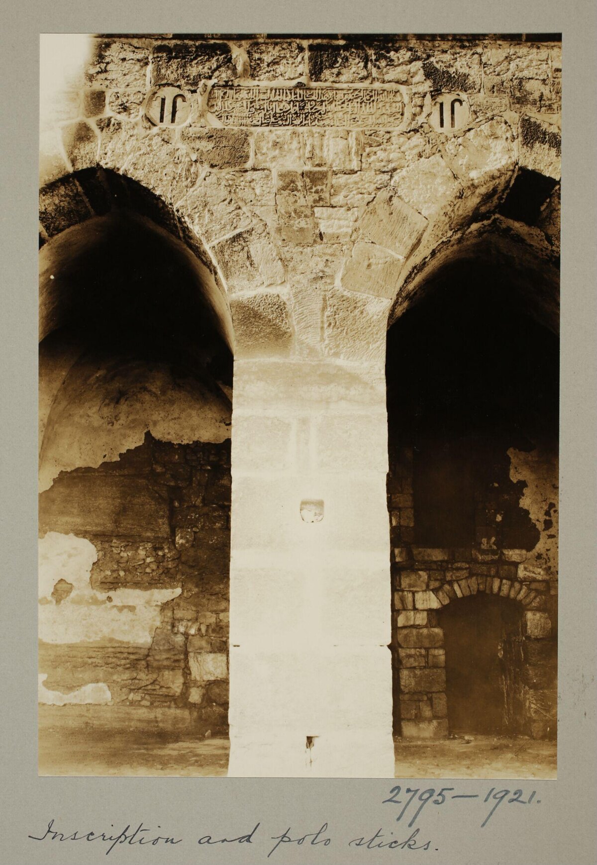 Old Photo of Inscription and Polo Sticks