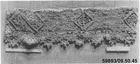 Excavated Carved Stone Fragment