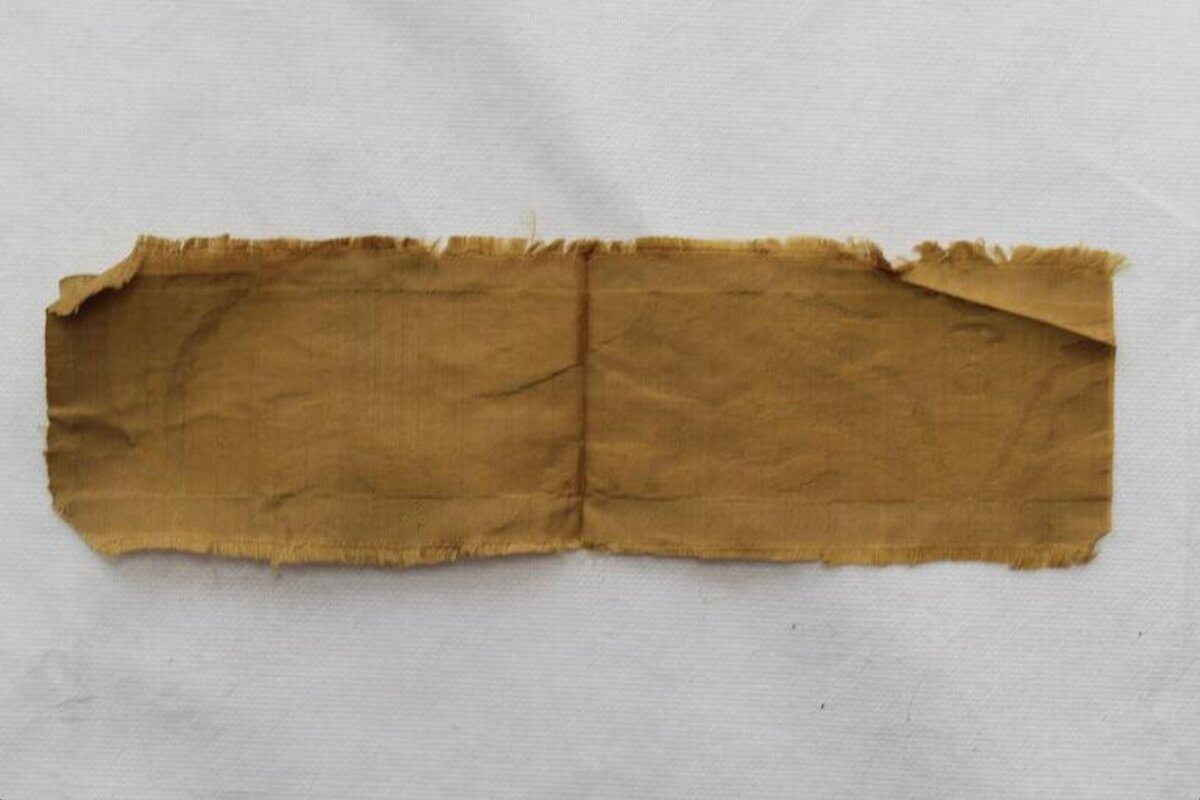 Brown Fabric Scrap on White Background