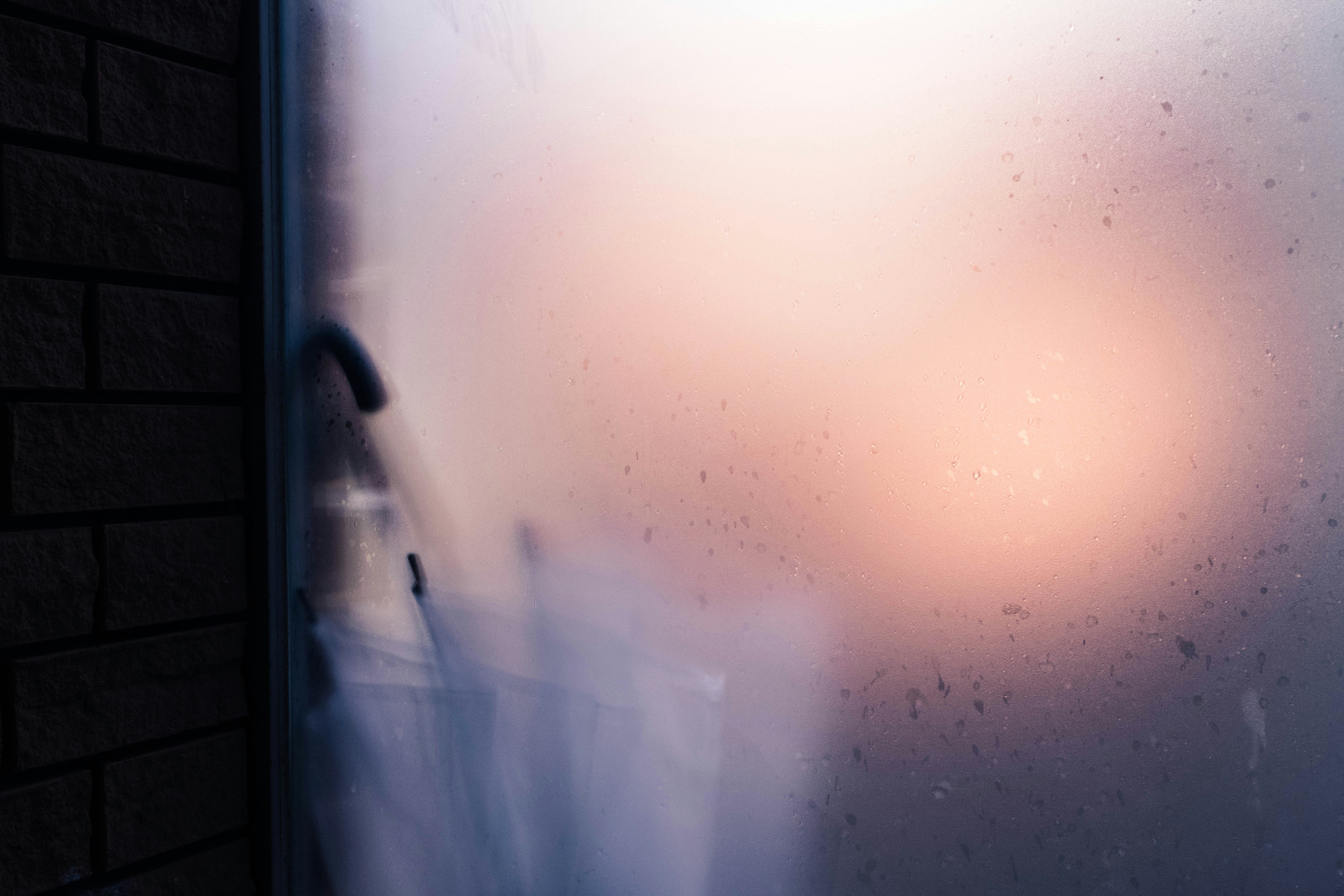 Fogged Window with Warm Sunlight
