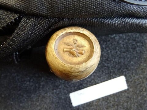 Worn Brass Button With Clasped Hands Emblem