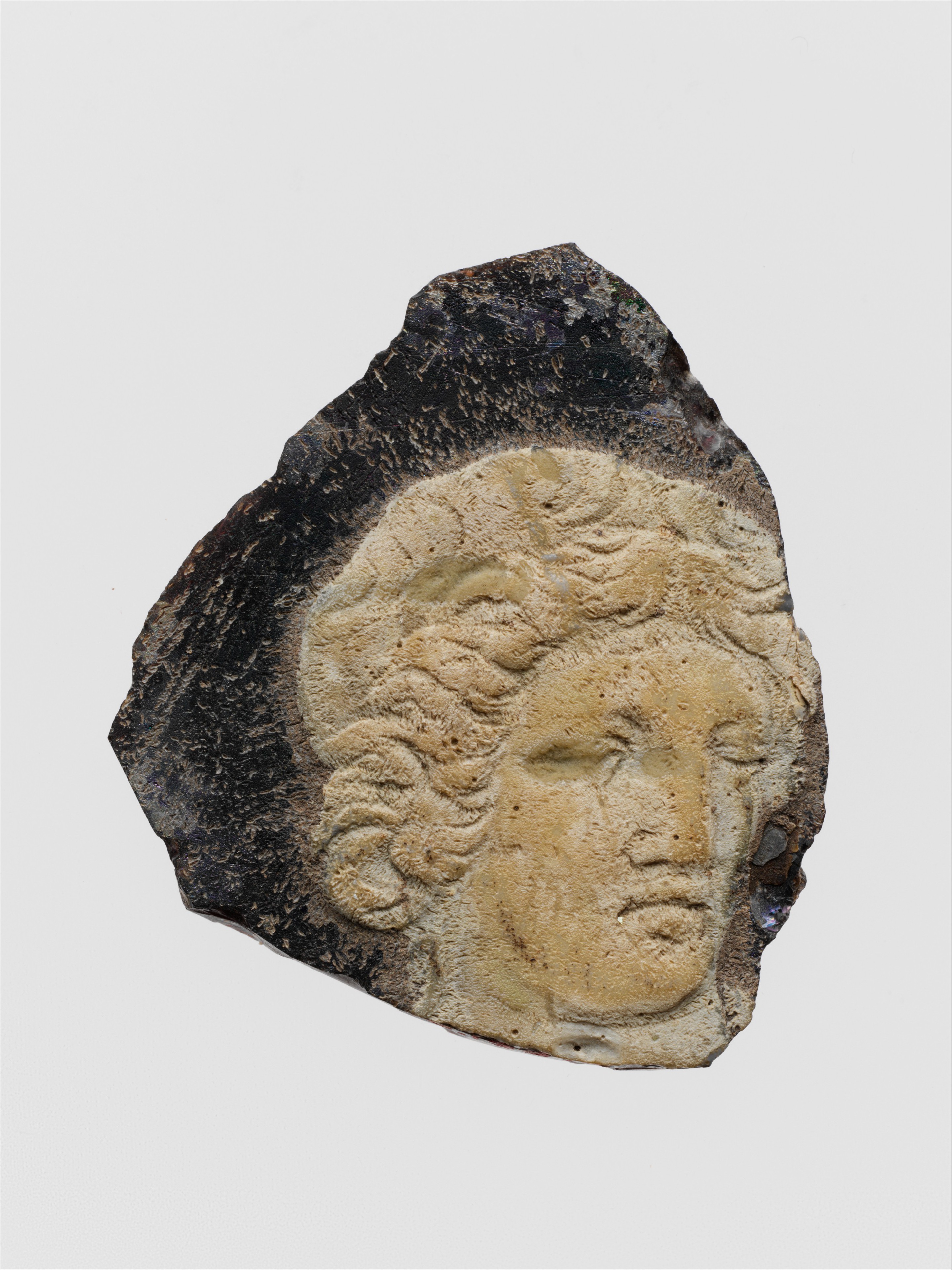 Ancient Carved Head Relief Fragment