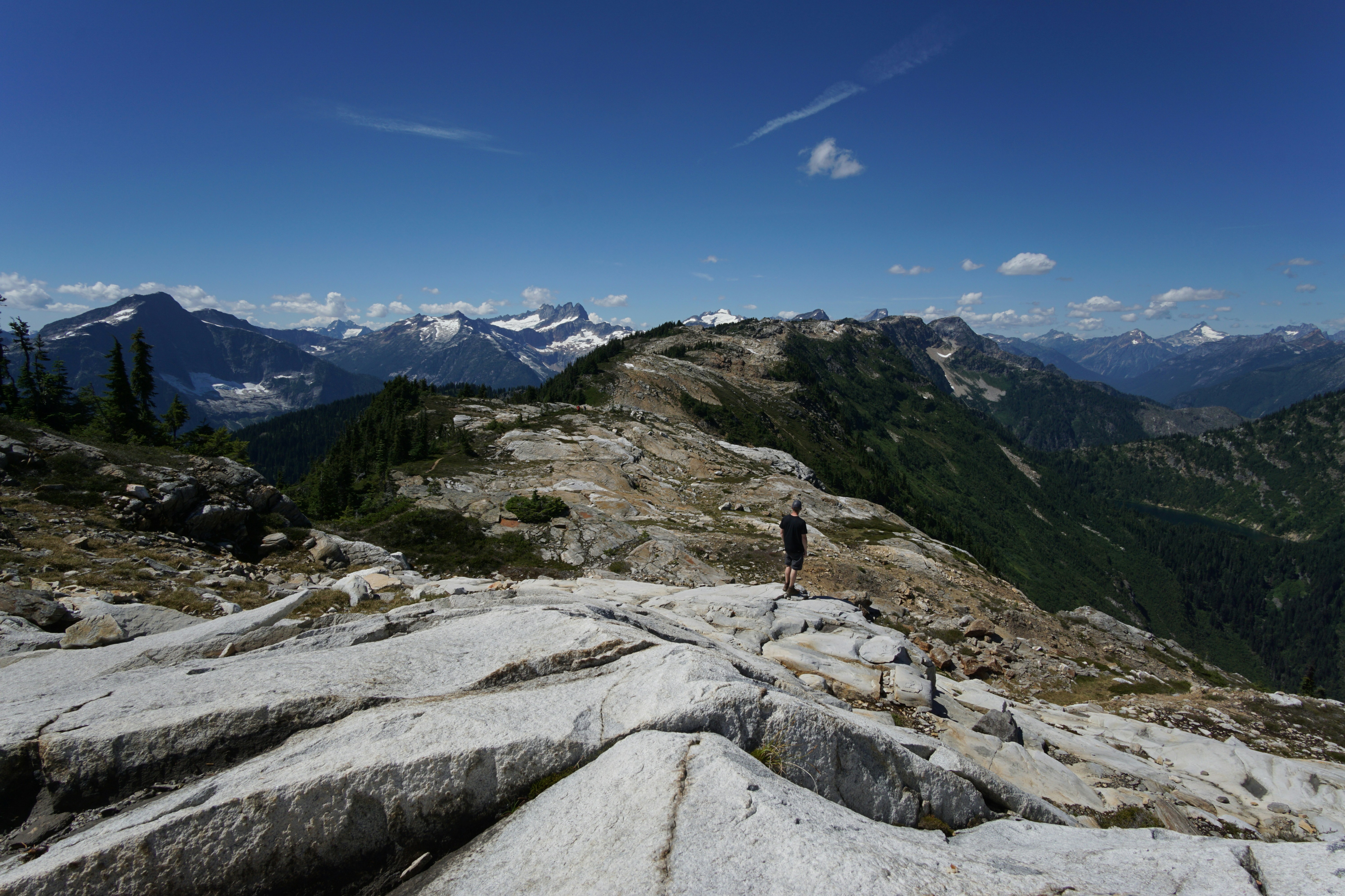 Hiker Overlooking Mountain Range