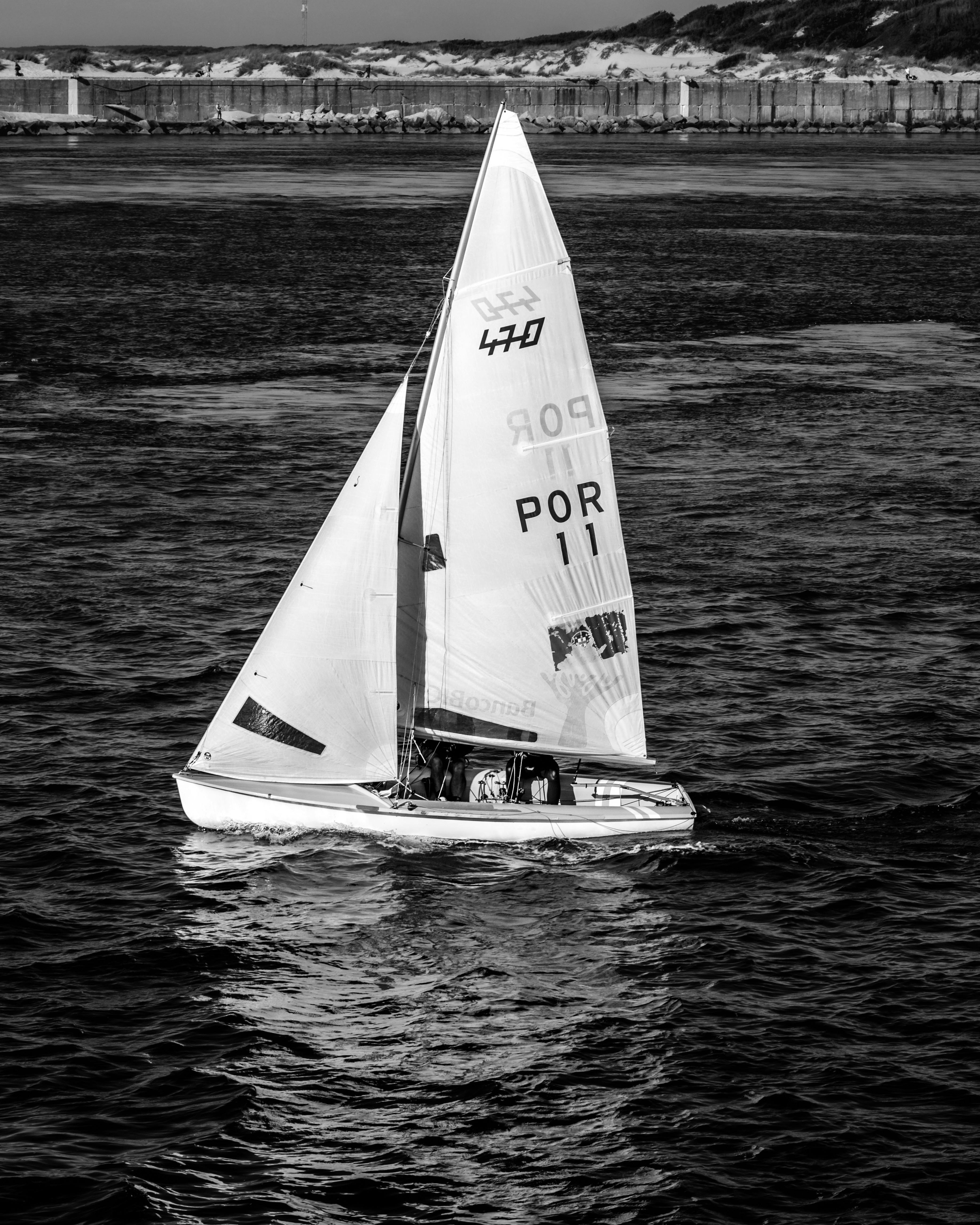 470 Class Sailboat Sailing Near Coast