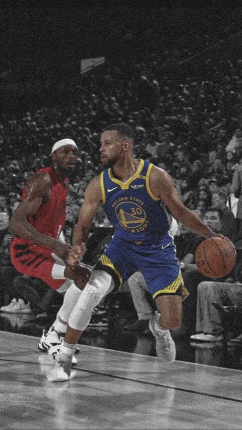 Stephen Curry Dribbling in Basketball Game