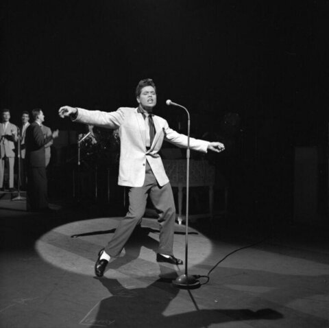 Male Singer Performing on Stage