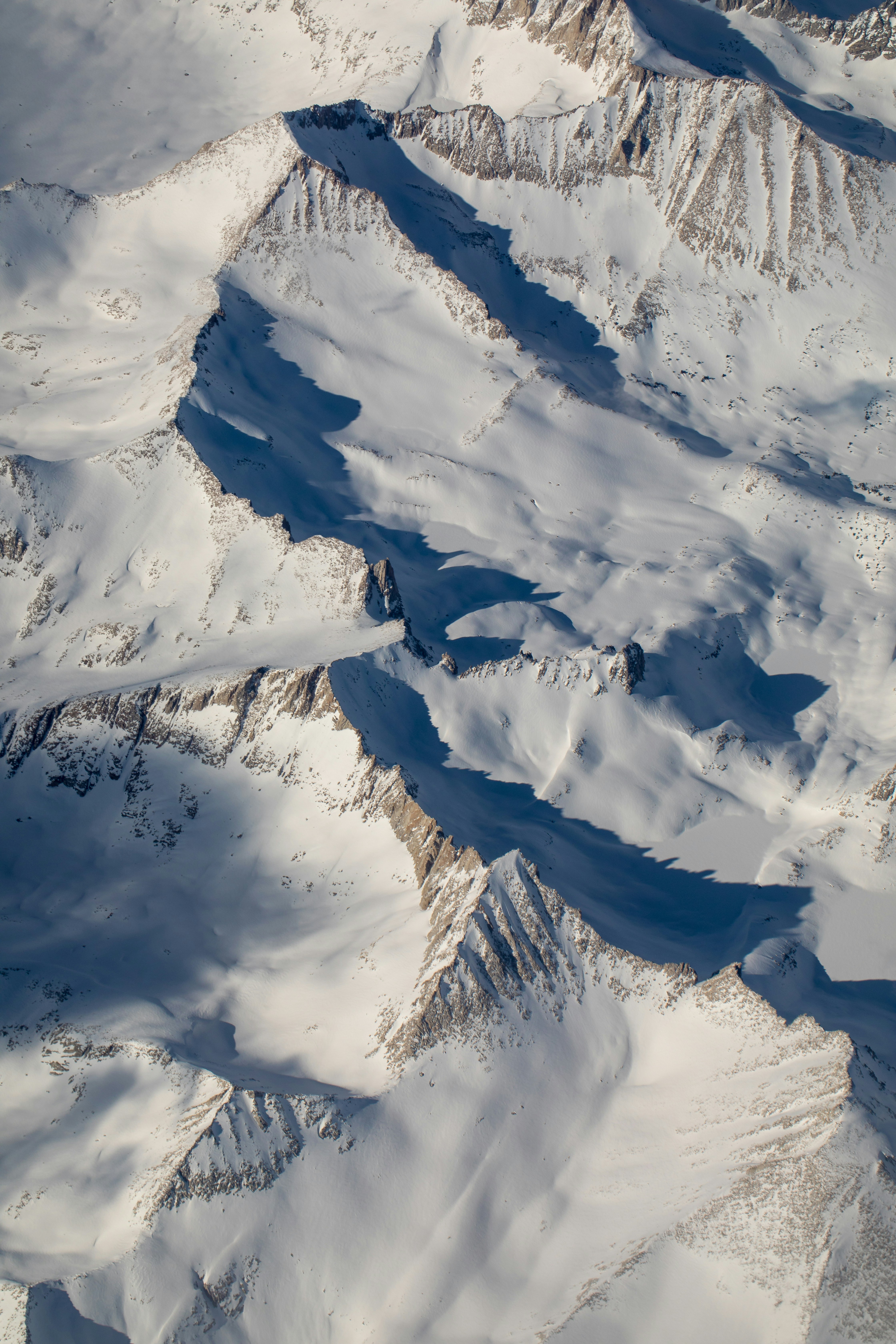 Aerial View of Snow-covered Mountains