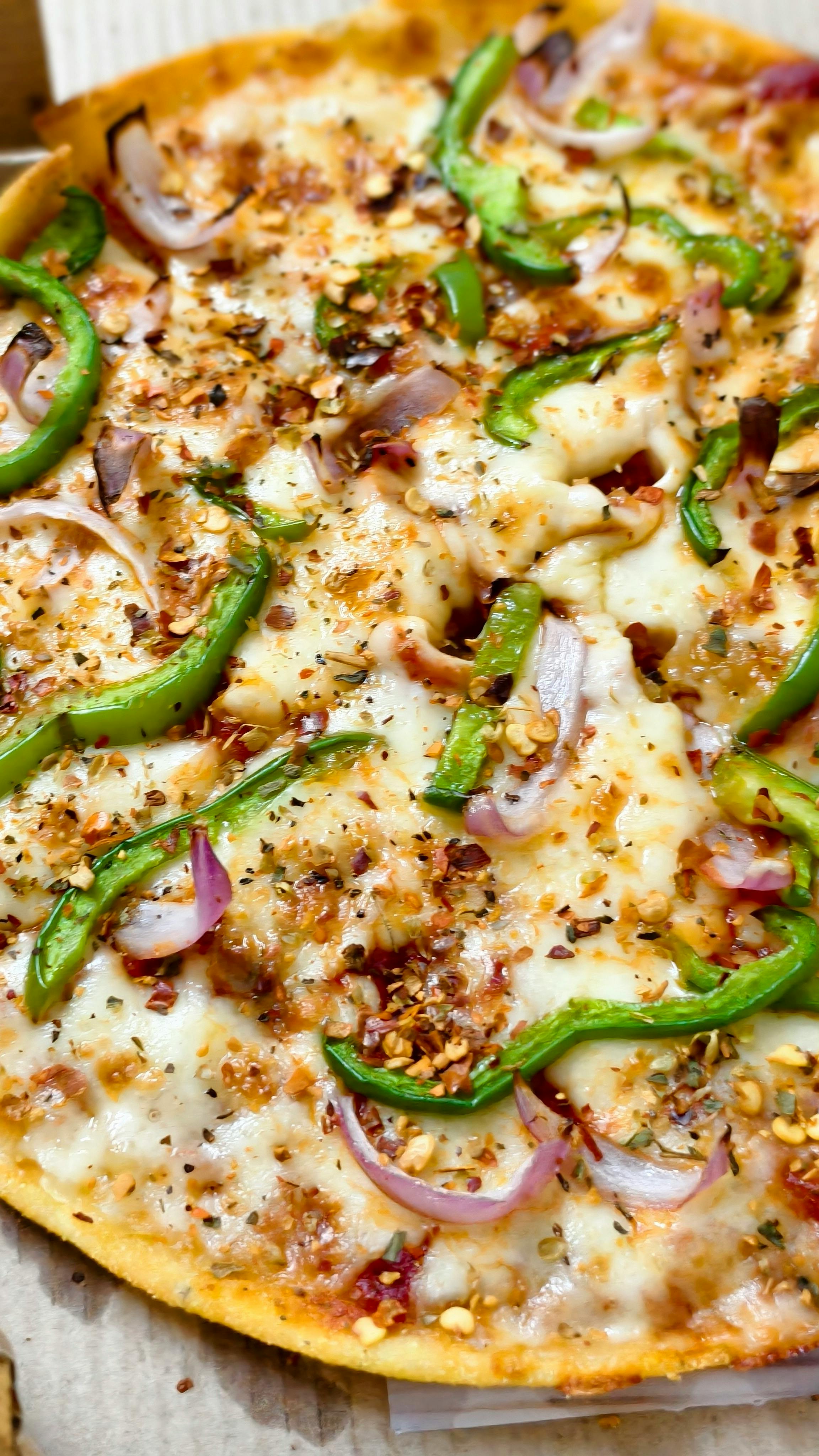 Vegetable Topped Cheese Pizza