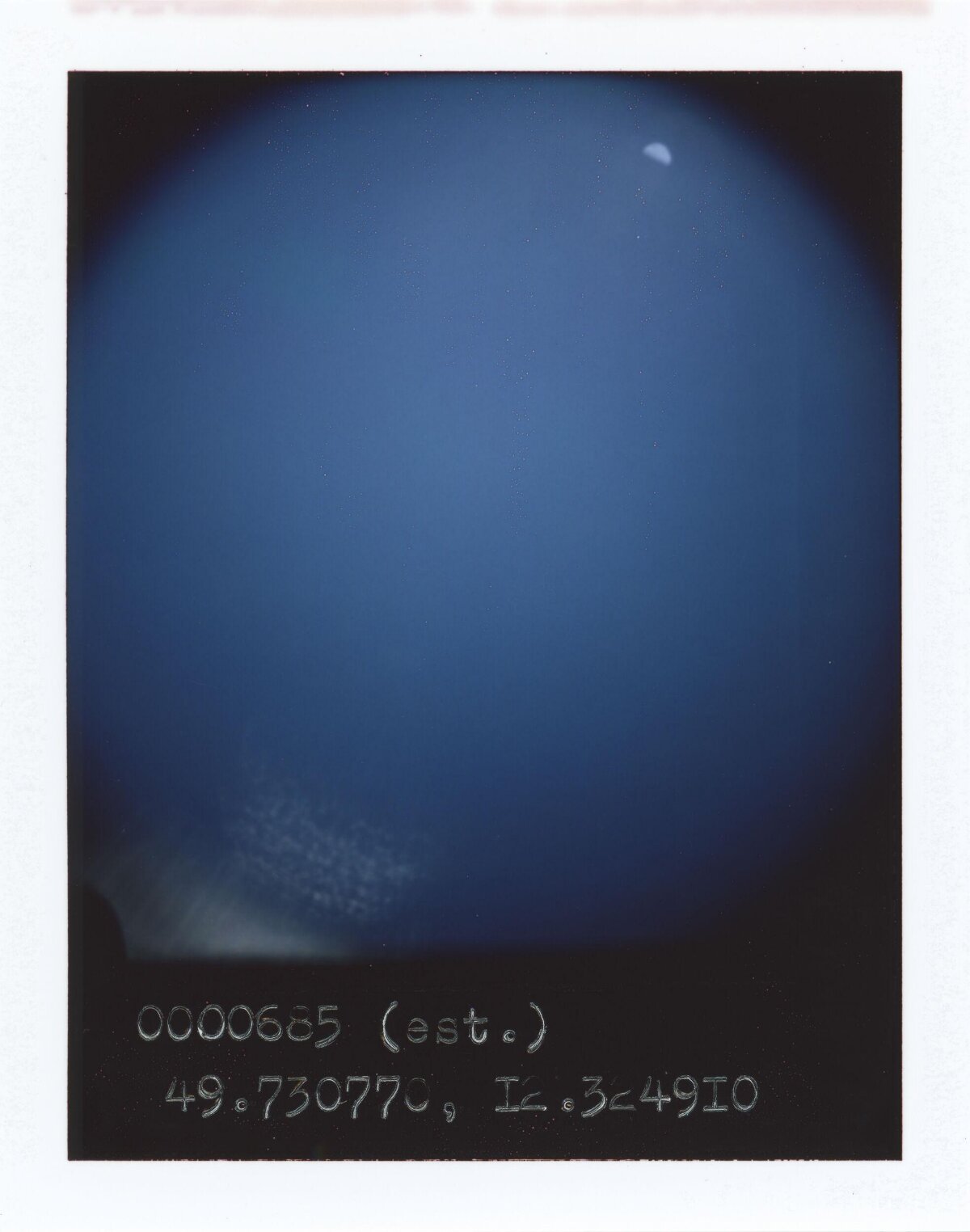 Deep Blue Sky with Moon and Coordinates