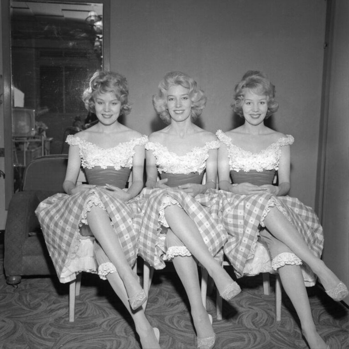 Three Women in Matching Dresses