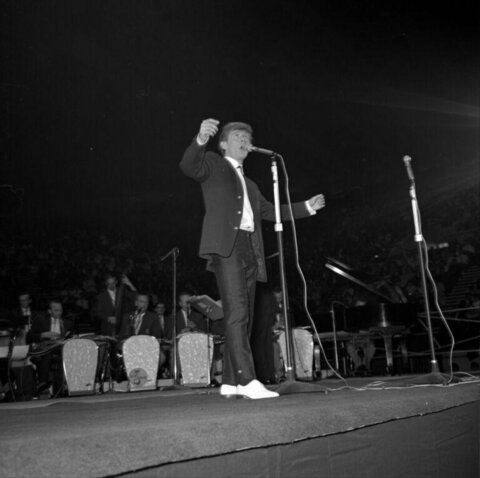 Male Singer Performing on Stage