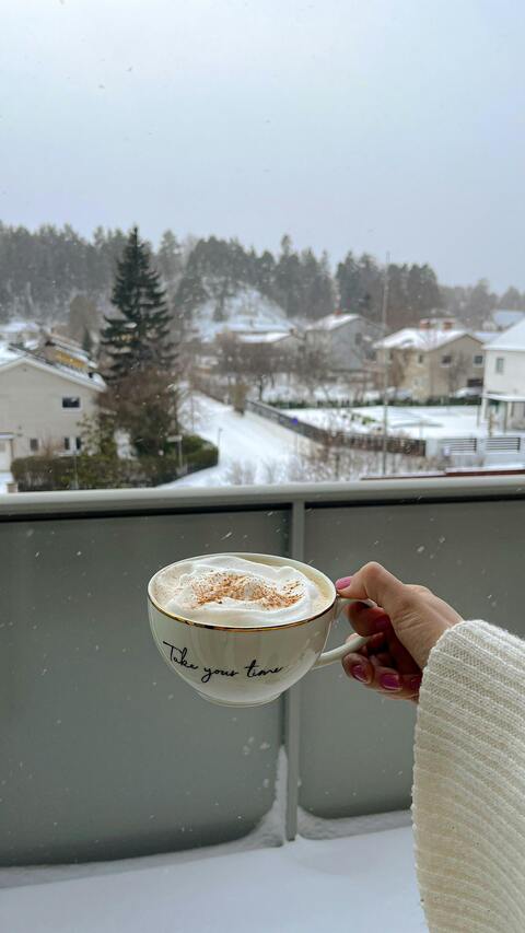 Coffee with Snowy Winter View