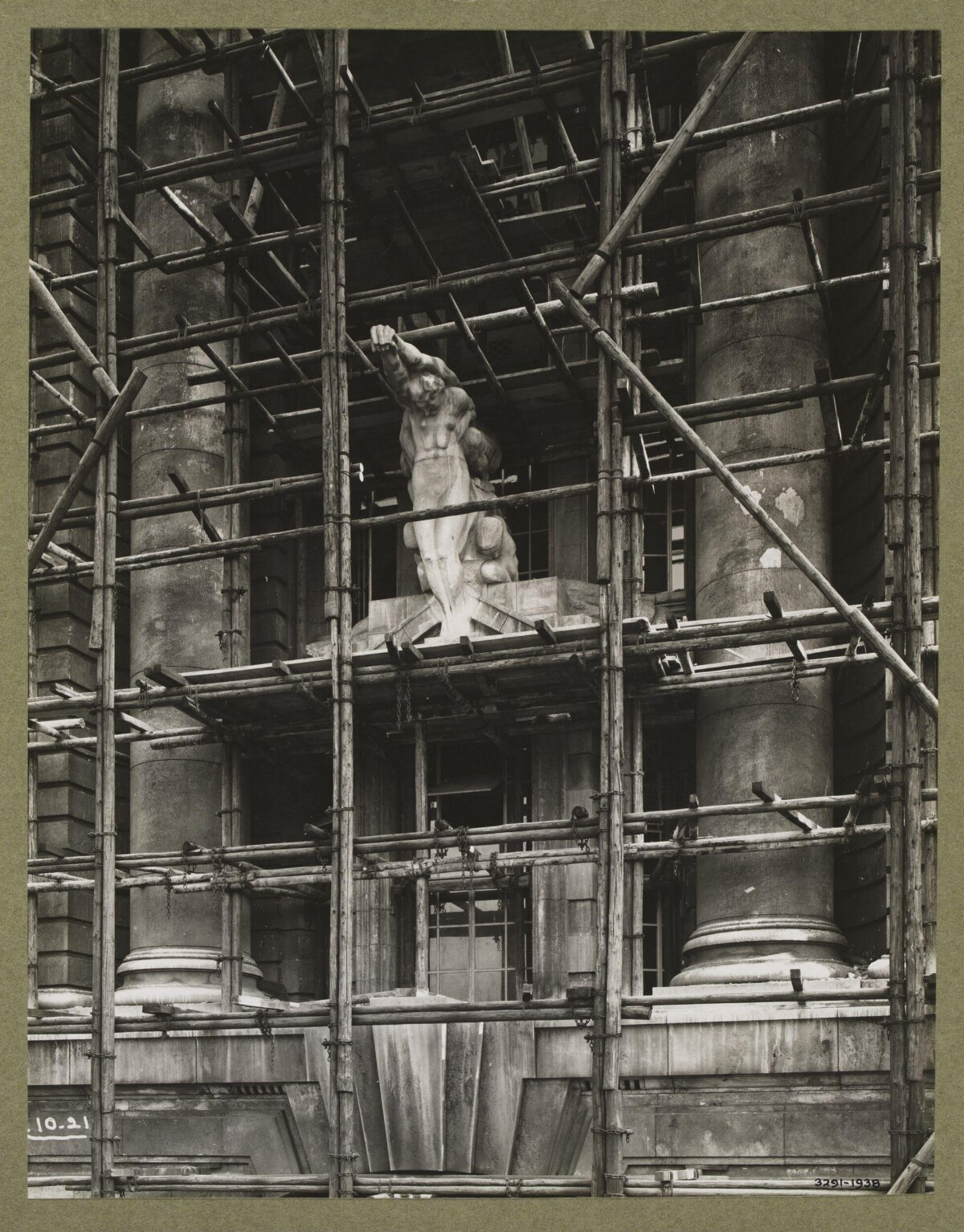 Building Facade Statue Under Scaffolding
