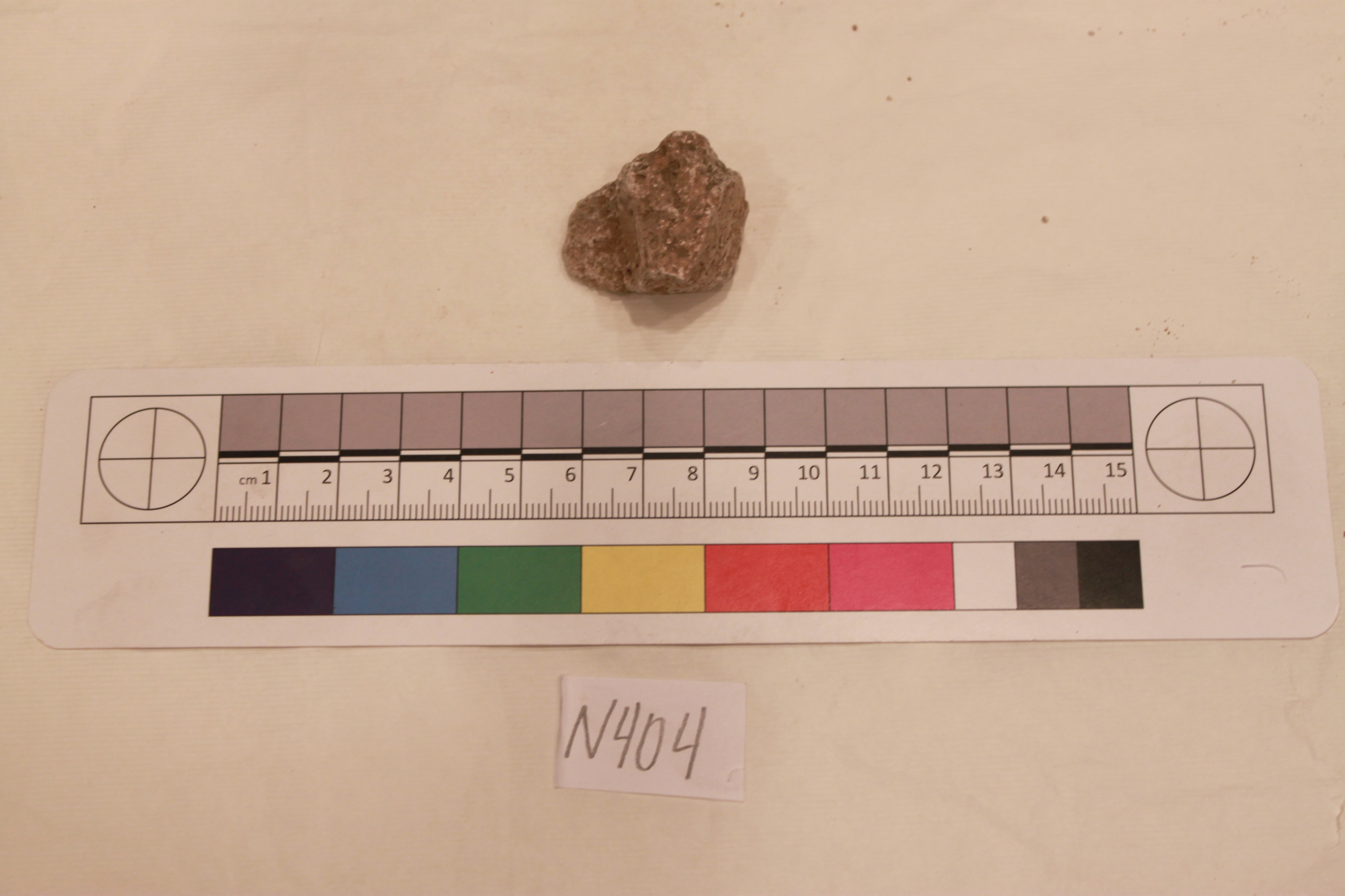 Rock specimen N404 with measuring scale