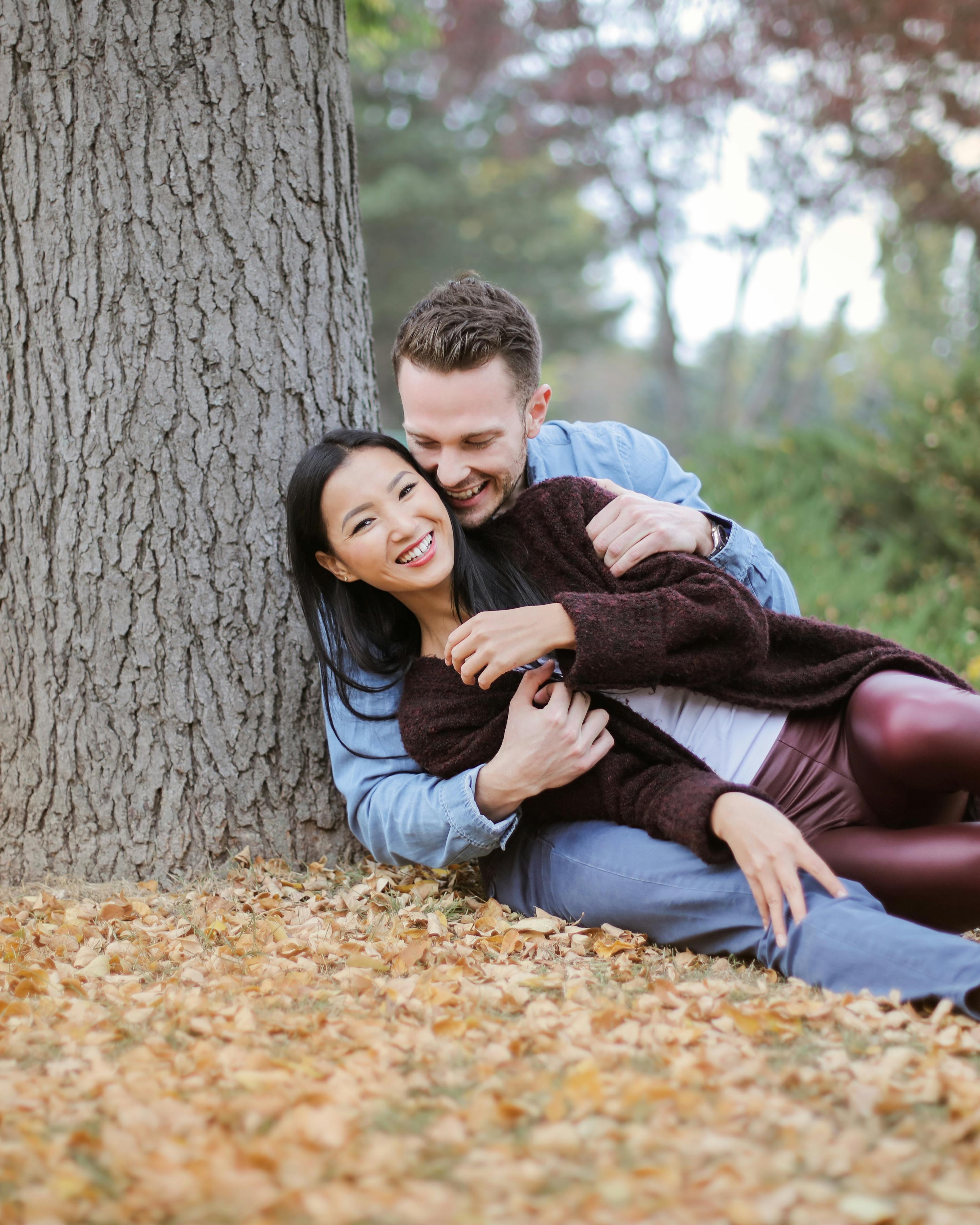 Couple Embracing in Autumn Park
