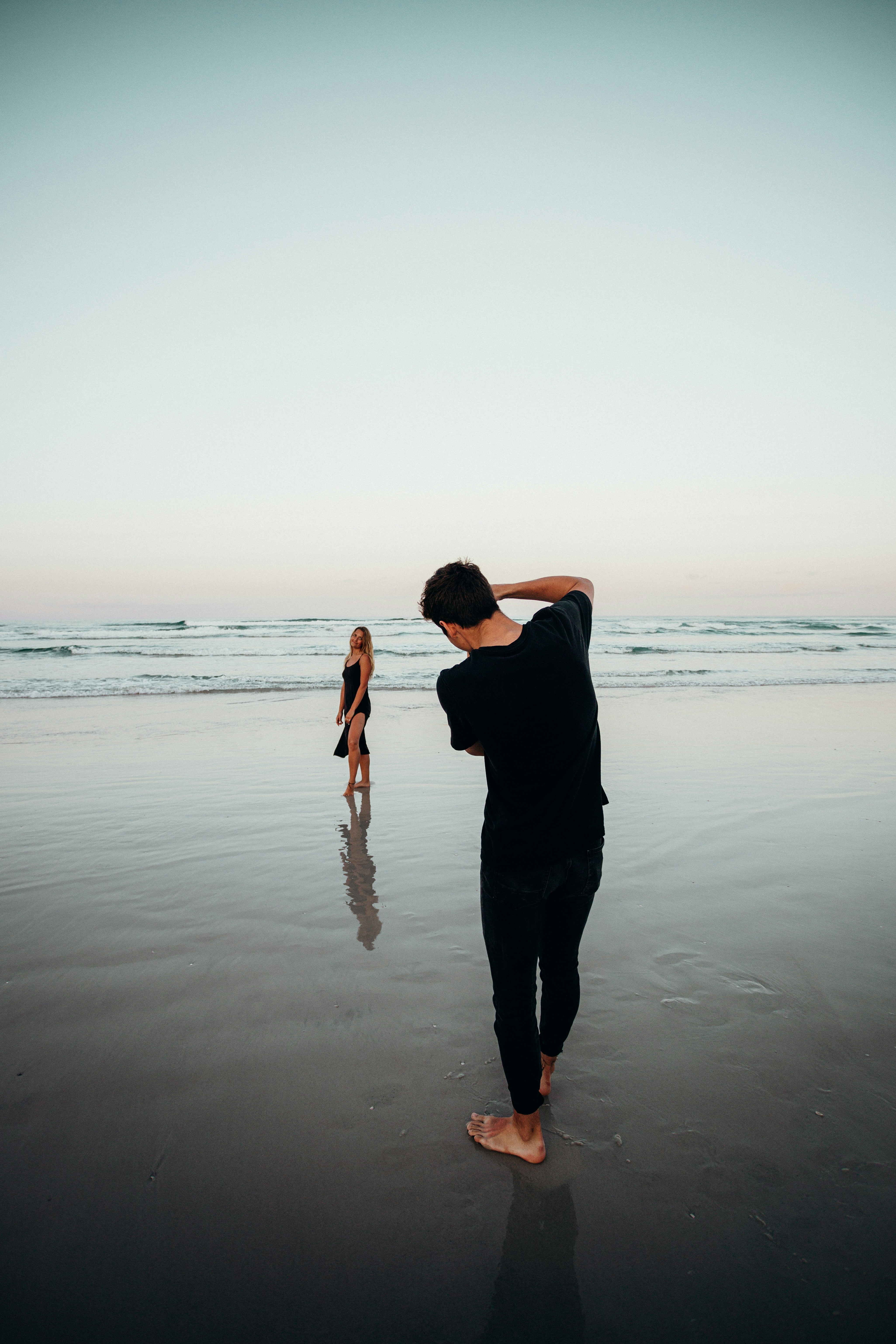 Photographer Shooting Woman on Beach