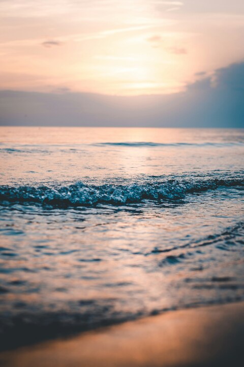 Sunset Waves on Seashore