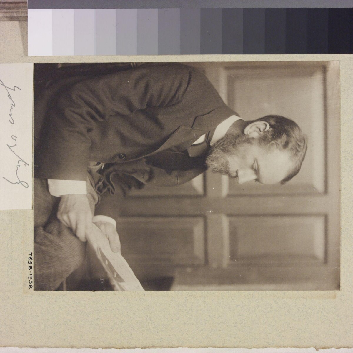 Vintage Portrait of Bearded Man Reading
