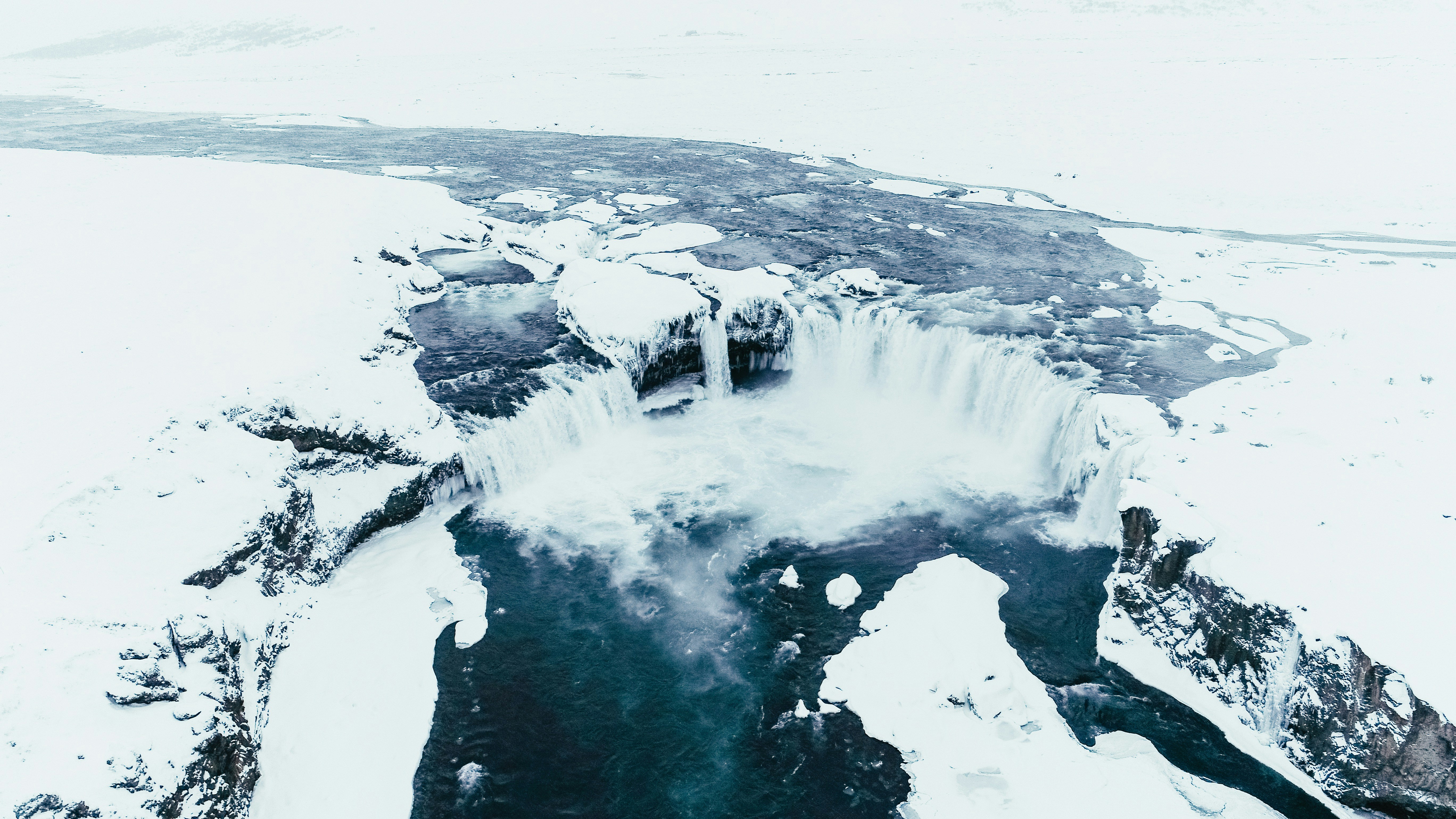 Snow-covered Winter Waterfall