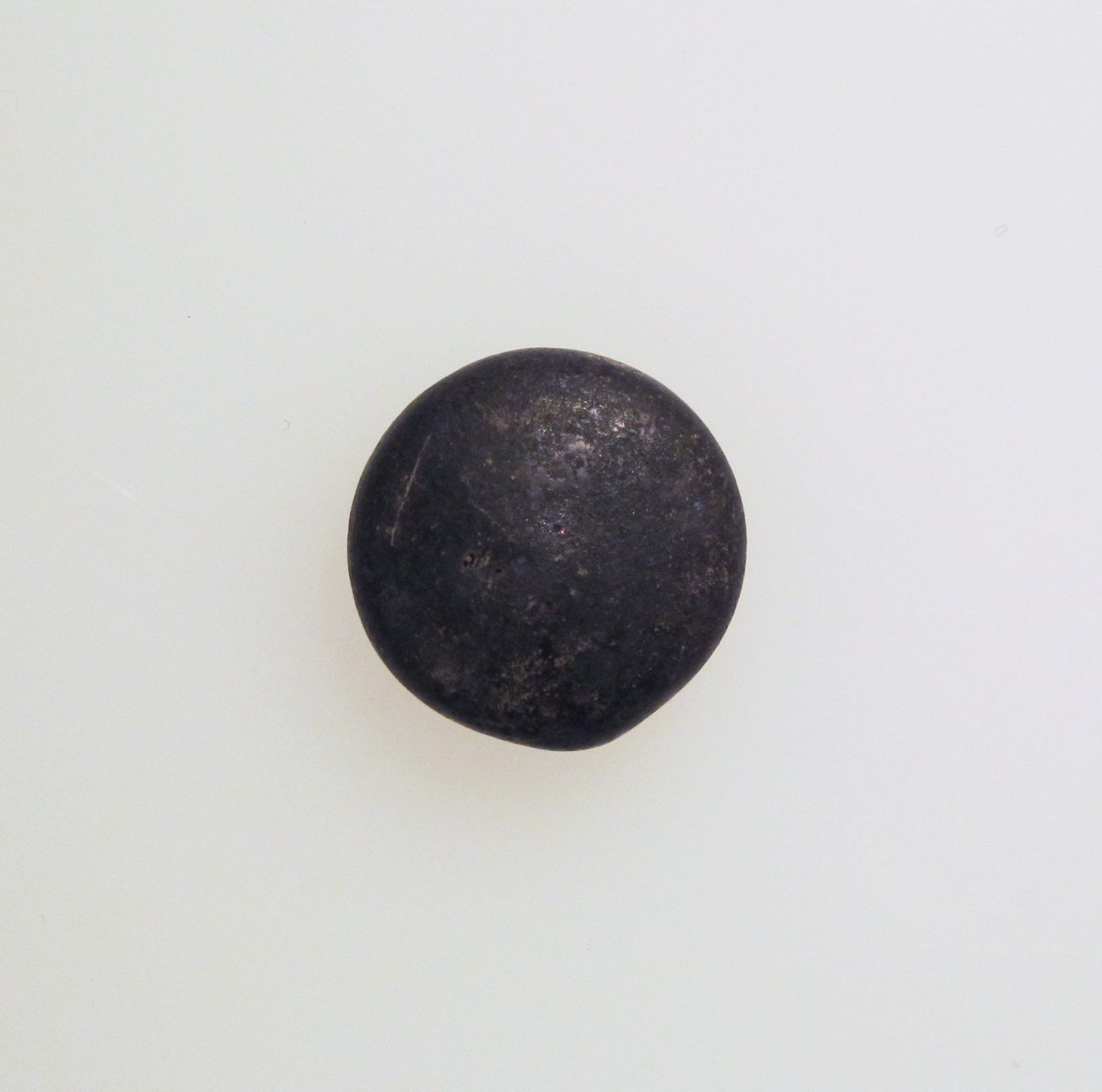Dark Round Stone on White Background