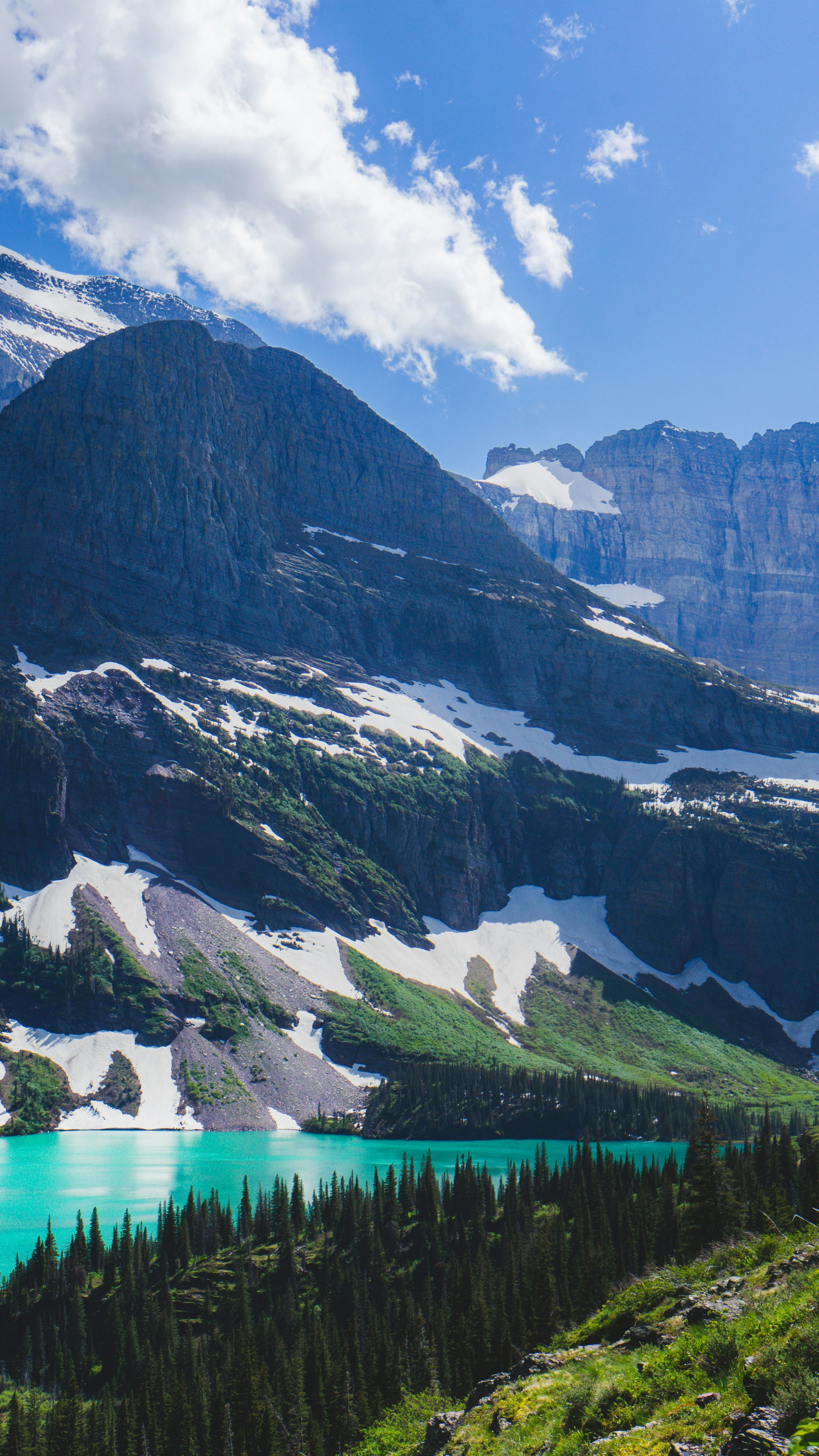 Turquoise Lake Below Snowy Mountains