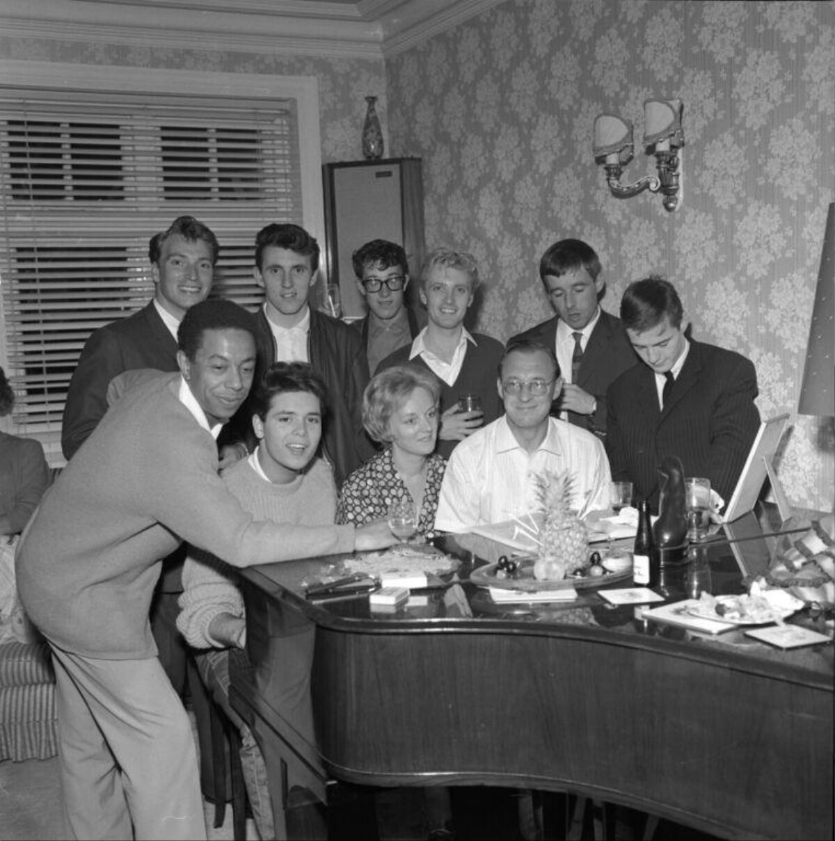 Group Gathered Around Piano