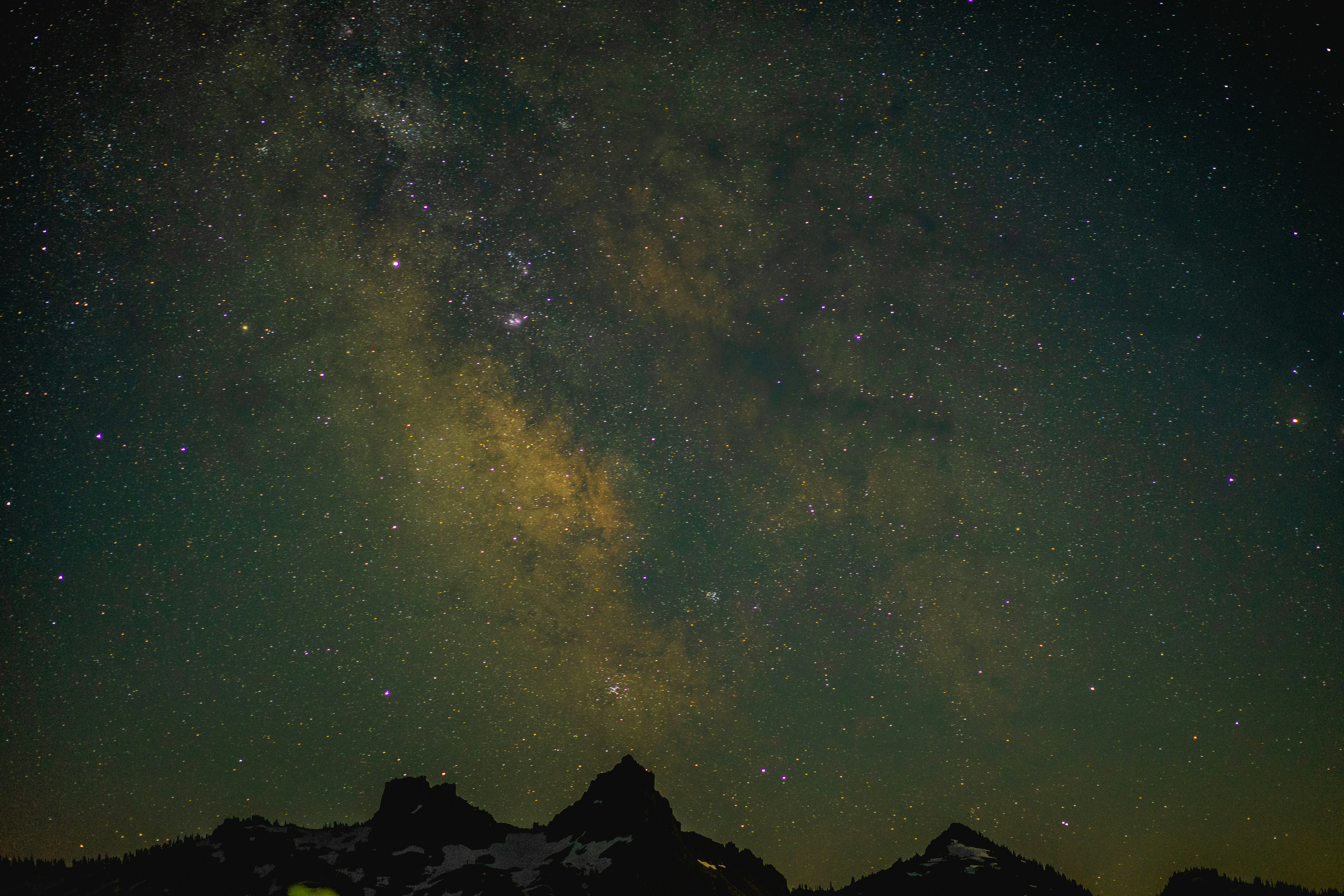 Milky Way Over Snowy Mountain Peaks
