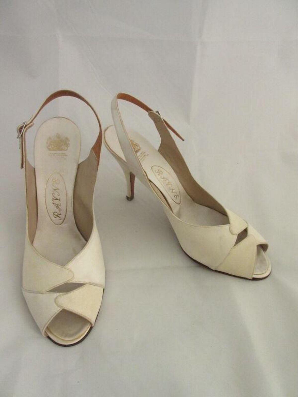 Pair of Ivory Slingback High Heels