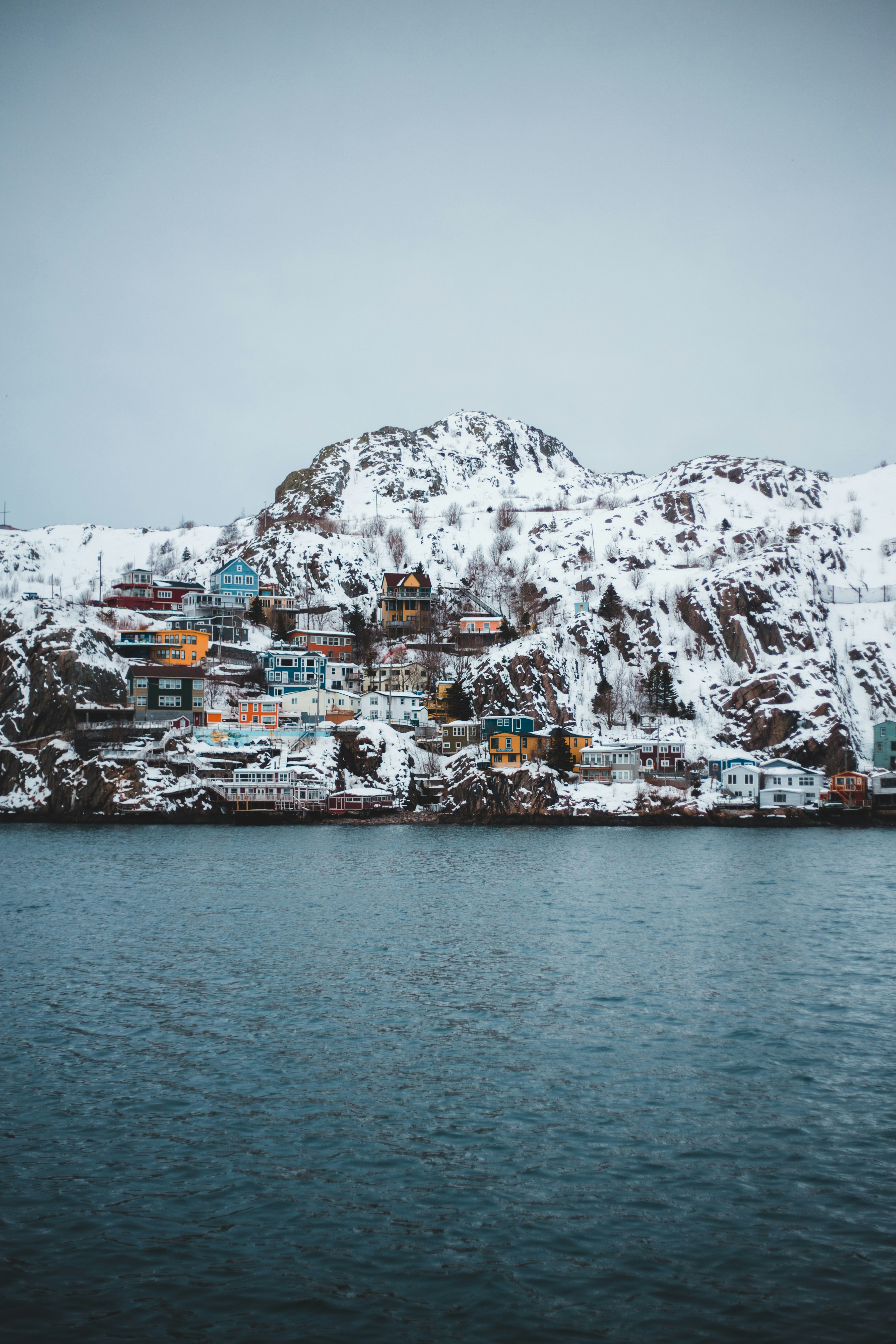 Snowy Coastal Hillside Village