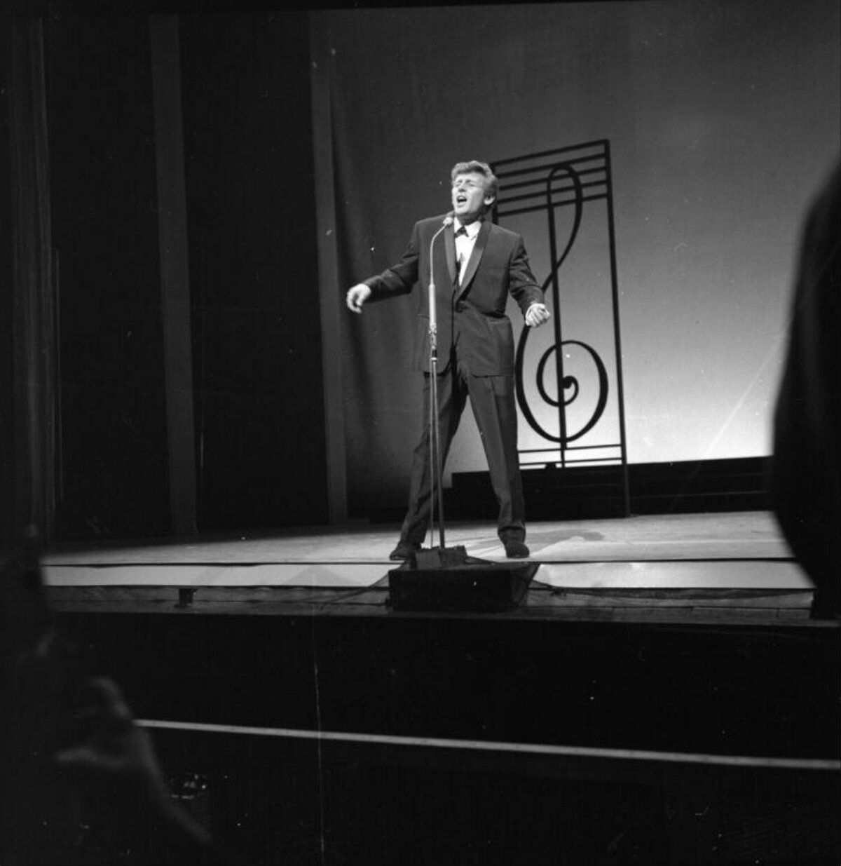 Male Singer Performing on Stage