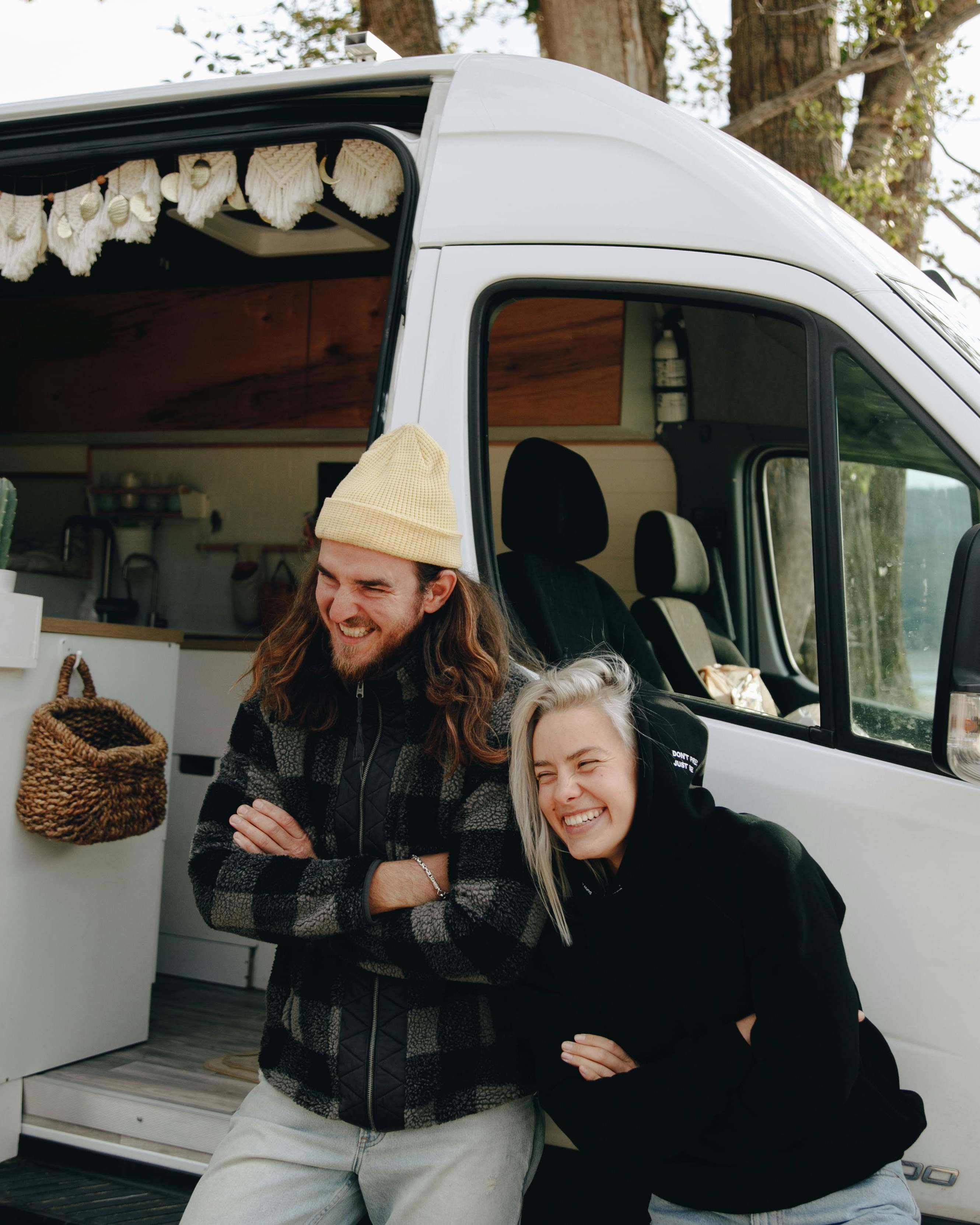 Couple Laughing by Camper Van