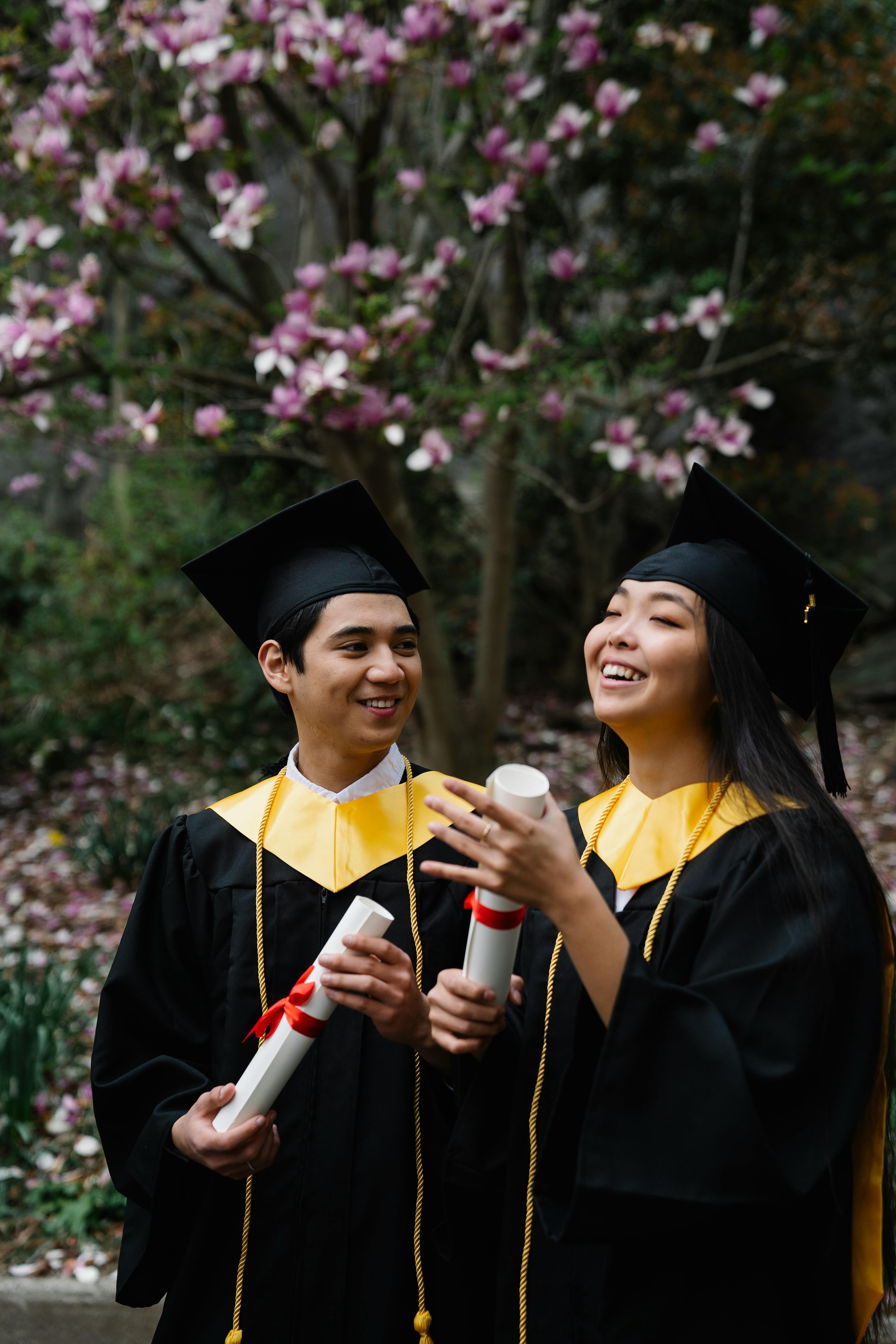 Two Happy Graduates Celebrating Graduation