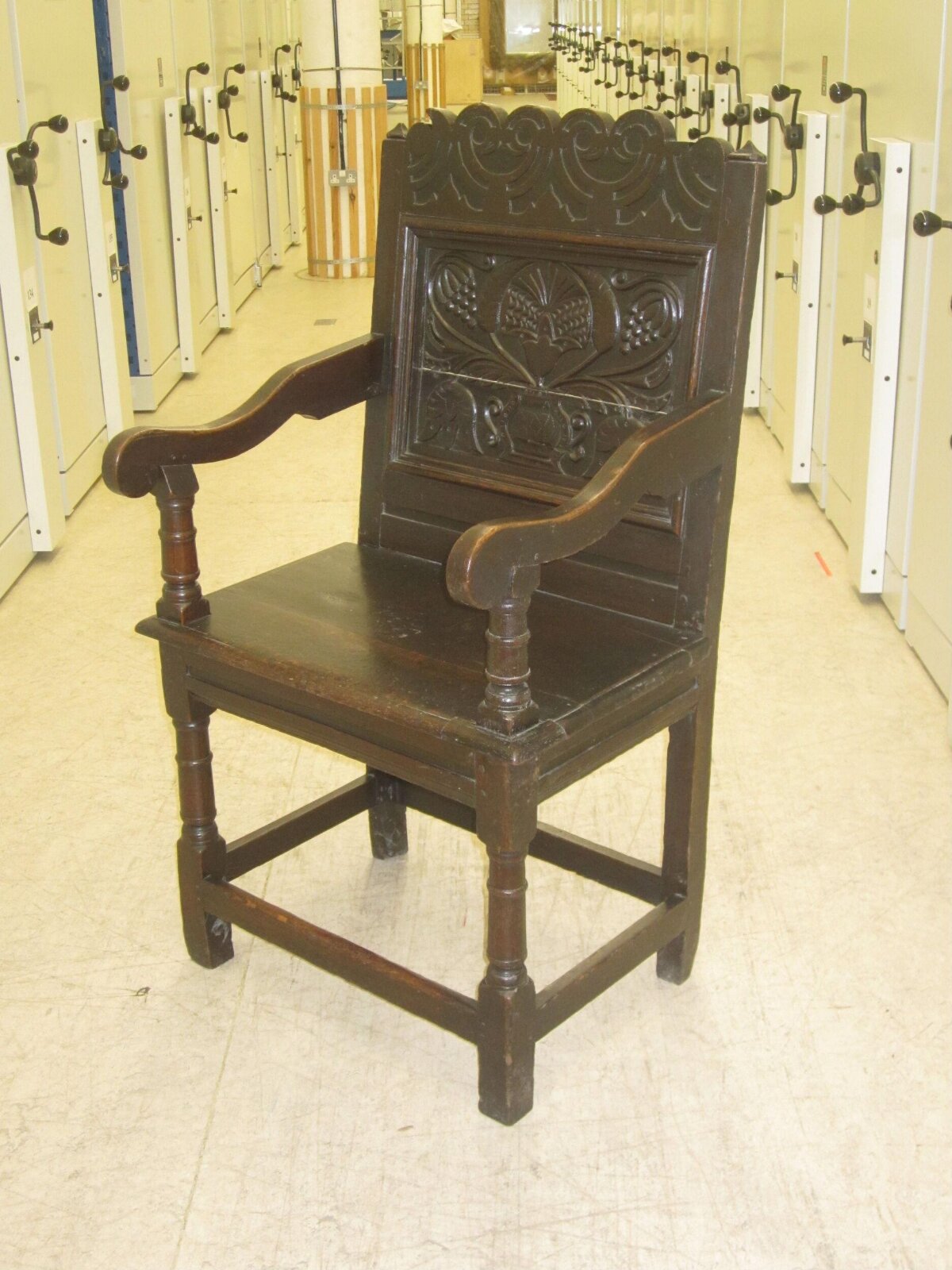 Carved Antique Dark Wood Armchair