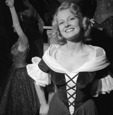 Smiling Actress in Theatrical Costume Backstage