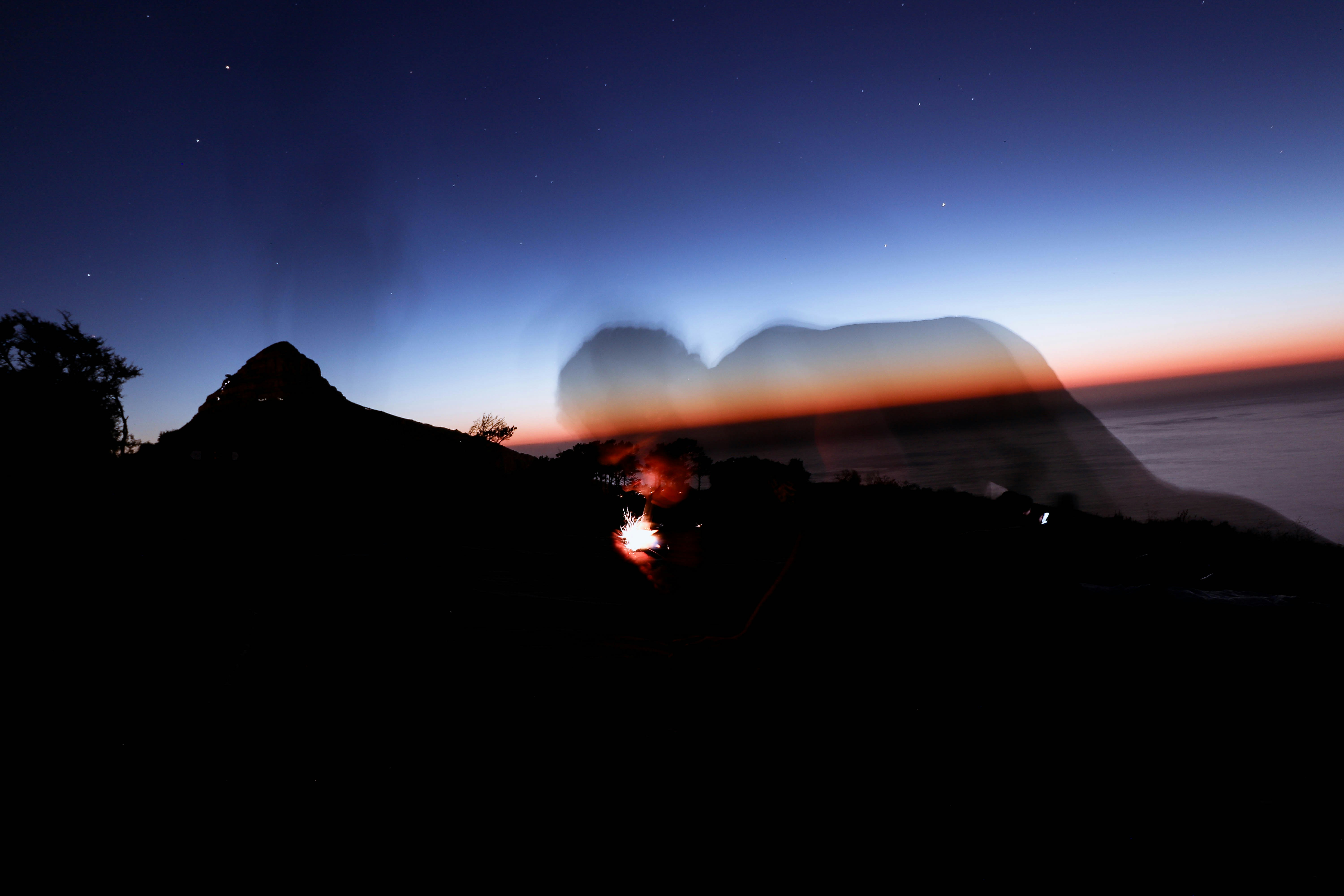 Twilight Mountain Campfire Double Exposure