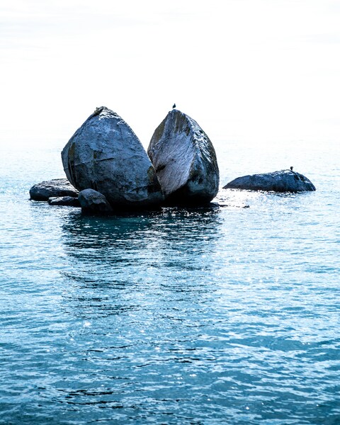 Split Rock in Calm Blue Sea