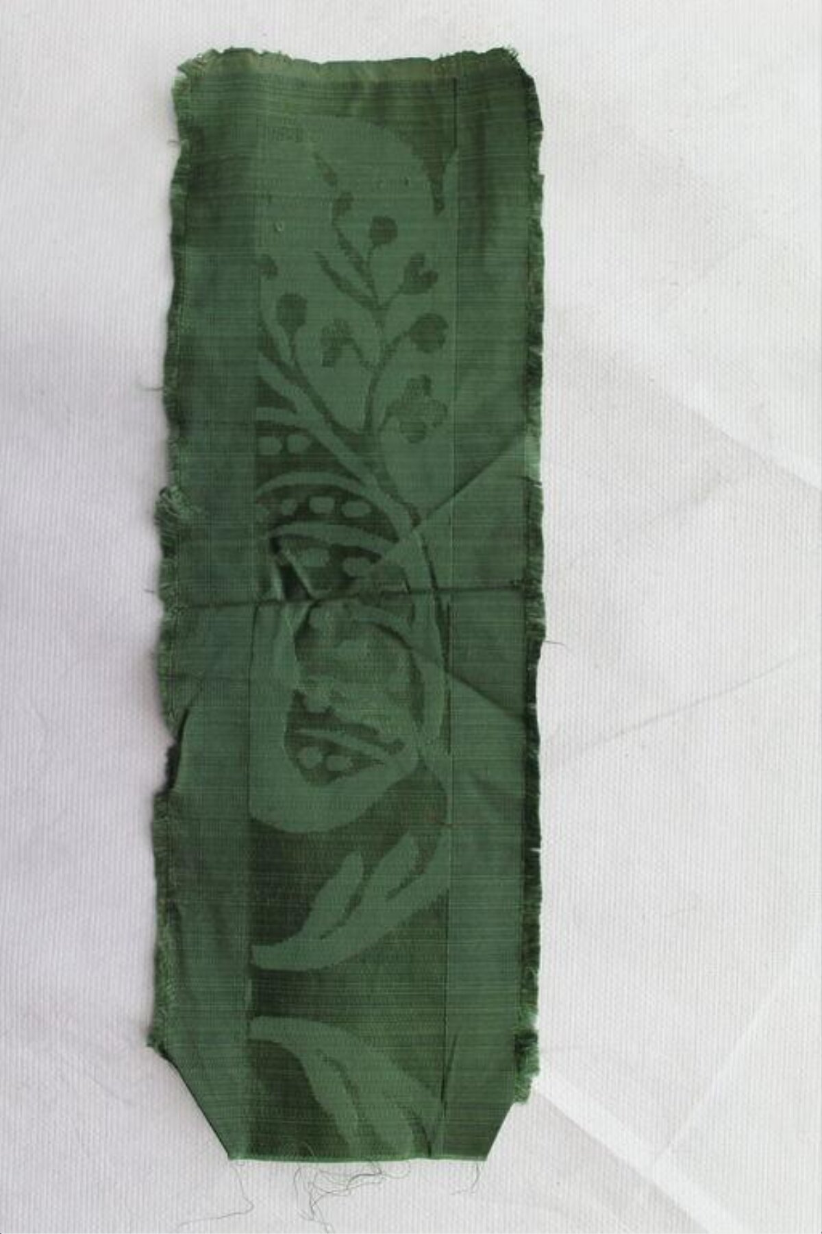 Green Patterned Textile Fragment